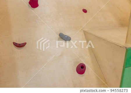 a public children's playground with a climbing house. a public children's playground with a climbing house. 94558273