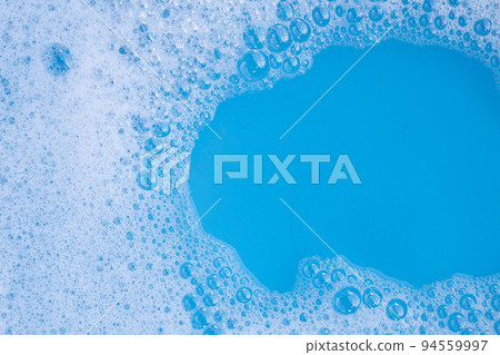 Detergent foam bubble, blue background. Detergent foam bubble, blue background. 94559997