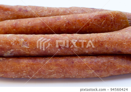 Chinese sausage on white background. Chinese sausage on white background. 94560424