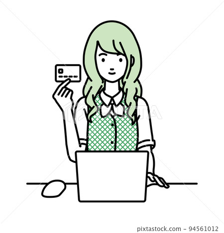 A woman in a clerk uniform sitting at a desk and using a PC while holding a credit card A woman in a clerk uniform sitting at a desk and using a PC while holding a credit card 94561012