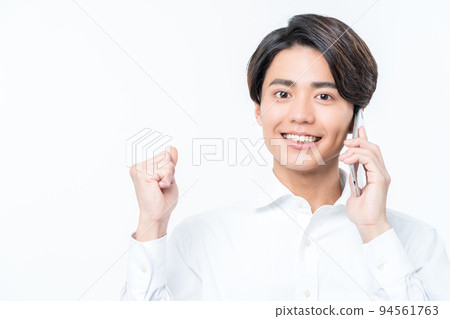 Young man in white shirt Guts pose 94561763