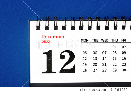 The December 2022 Monthly desk calendar for 2022 year on blue background. The December 2022 Monthly desk calendar for 2022 year on blue background. 94561981