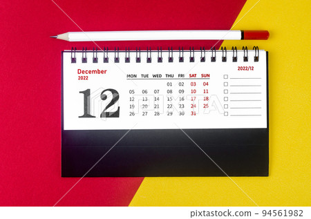 The December 2022 Monthly desk calendar for 2022 year with white pencil on beautiful background. The December 2022 Monthly desk calendar for 2022 year with white pencil on beautiful background. 94561982