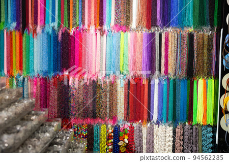 Many different fashionable beaded beads on the stand in store Many different fashionable beaded beads on the stand in store 94562285