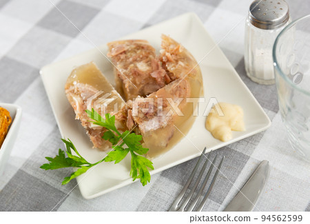 Pieces of homemade pork aspic, meat jelly Pieces of homemade pork aspic, meat jelly 94562599