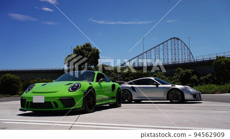 Two Porsche 911GT3RS standing in the parking lot Two Porsche 911GT3RS standing in the parking lot 94562909