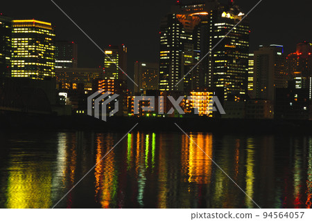 Evening and night view of Umeda from Osaka Yodogawa riverbed 94564057