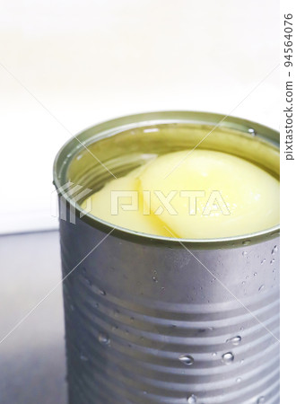 Open canned peaches 94564076