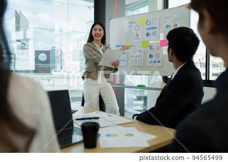 Financial Analyst discussing with Investment Banker at Meeting Room. Fund investment concept Financial Analyst discussing with Investment Banker at Meeting Room. Fund investment concept 94565499