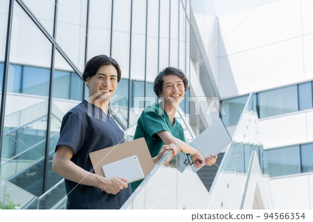 Portrait of two young male medical workers Cooperation with "LINK FOREST" 94566354