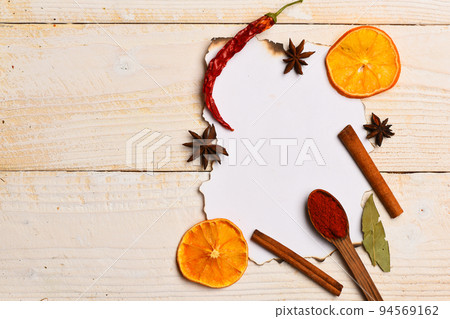 Food art concept. Composition of condiment on paper piece. Food art concept. Composition of condiment on paper piece. 94569162