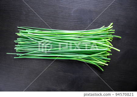 Bunch of chives isolated on black Bunch of chives isolated on black 94570821