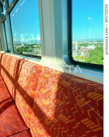 Morning sun shining on the early morning train 94570939