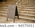 signboard on stairs 94575051