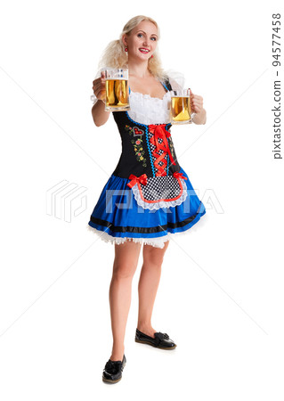 Beautiful young blond girl of oktoberfest beer stein Beautiful young blond girl of oktoberfest beer stein 94577458