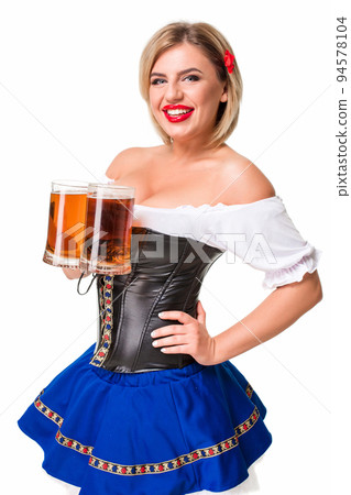 Beautiful young blond girl of oktoberfest beer stein Beautiful young blond girl of oktoberfest beer stein 94578104