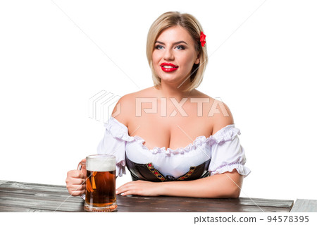 Beautiful young blond girl of oktoberfest beer stein Beautiful young blond girl of oktoberfest beer stein 94578395