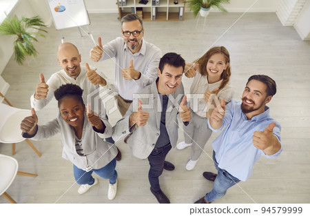 Group of happy colleagues or satisfied customers give recommendation for good service. 94579999