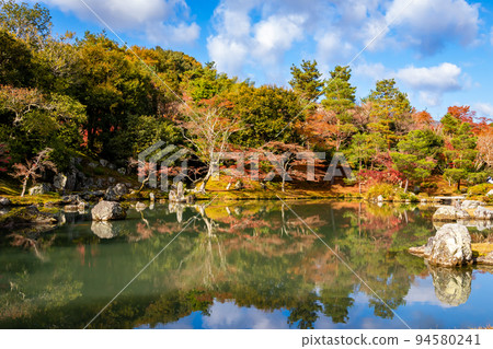 Autumn leaves and clear blue sky around Sogenchi Garden at Tenryu-ji Temple in Kyoto Autumn leaves and clear blue sky around Sogenchi Garden at Tenryu-ji Temple in Kyoto 94580241