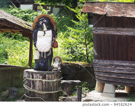 A large Shigaraki-yaki raccoon dog and a sake barrel, Kyoto A large Shigaraki-yaki raccoon dog and a sake barrel, Kyoto 94582624