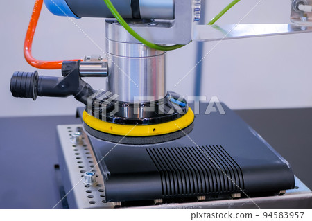 Automated robotic arm moves and places objects at trade show, exhibition Automated robotic arm moves and places objects at trade show, exhibition 94583957