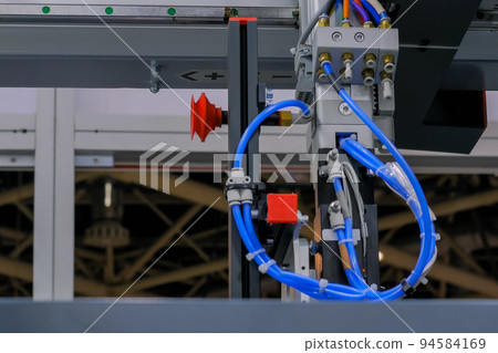 Automatic robotic arm manipulator with suction cups at plant - close up 94584169