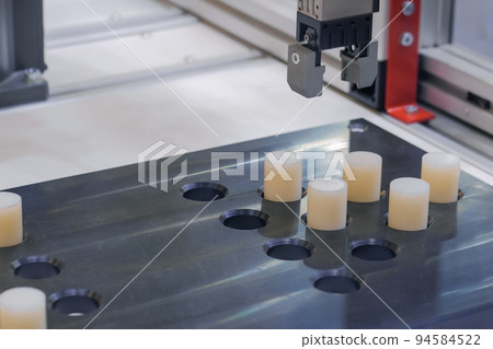 Automated robotic clamp arm, robot hand during work at exhibition, close up 94584522