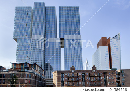 Building De Rotterdam by architect Rem Koolhaas and old warehouses Building De Rotterdam by architect Rem Koolhaas and old warehouses 94584528