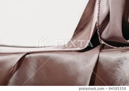 Luxury silk background stage scene for beauty and fashion premium product. Satin drapery empty table. display mockup showcase.  94585358