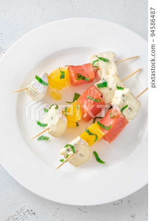 Skewers with cheese and trout 94586487