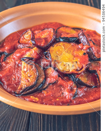 Fried eggplant with tomato sauce 94586494