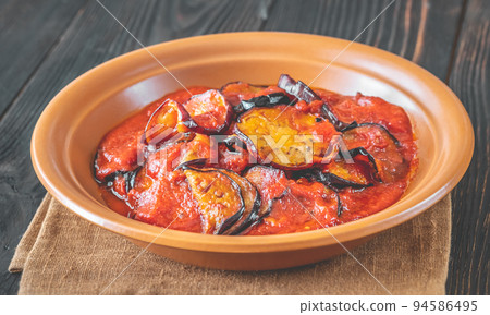 Fried eggplant with tomato sauce 94586495