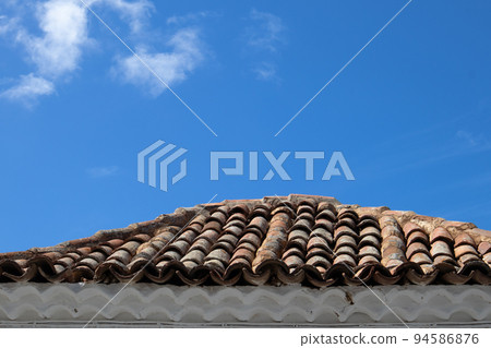 Traditional roof and a blue sky, Spain 94586876