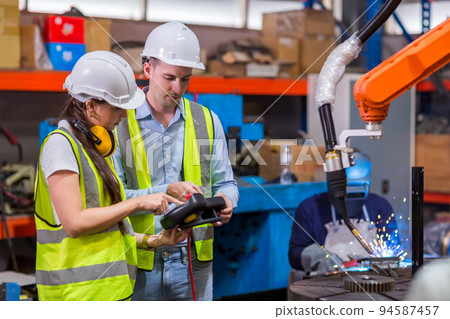 Engineer or Worker in intelligent factory industrial. Engineer or Worker in intelligent factory industrial. 94587457