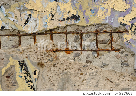 Old reinforced concrete structure with damaged and rusty metallic reinforcement that must be demolished - Metal bars rusty due to water infiltration into concrete 94587665