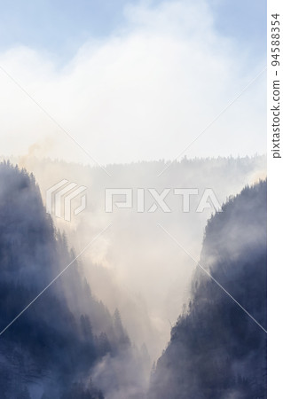 BC Forest Fire and Smoke over the mountain near Hope during a hot sunny summer day. BC Forest Fire and Smoke over the mountain near Hope during a hot sunny summer day. 94588354