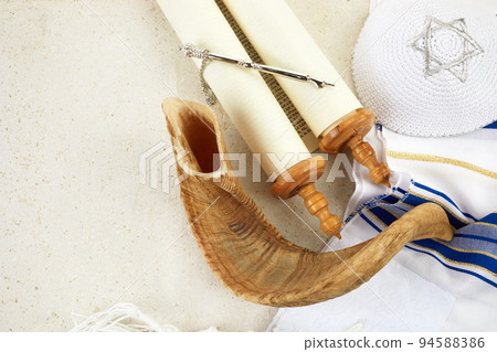 Yom kippur concept. Tallit, Thorah and Shofar jewish religious symbols Yom kippur concept. Tallit, Thorah and Shofar jewish religious symbols 94588386