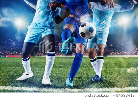 Football scene with competing soccer players at the stadium Football scene with competing soccer players at the stadium 94588412