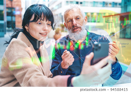 Business people work with trading stock market on a smartphone Business people work with trading stock market on a smartphone 94588415
