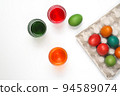 Easter eggs of different colors. Preparing for Easter Week. 94589074