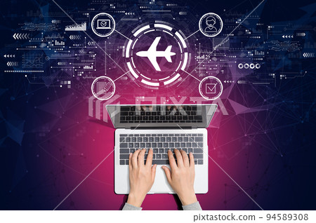 Flight ticket booking concept with person using laptop 94589308