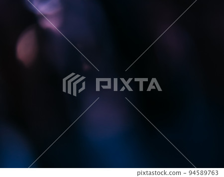 Bokeh light overlay. Lens flare texture. Blur rays glare. Defocused purple blue color flecks on dark night black abstract copy space background. Bokeh light overlay. Lens flare texture. Blur rays glare. Defocused purple blue color flecks on dark night black abstract copy space background. 94589763