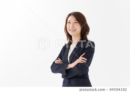 一個20多歲的女人,穿著西裝 一個20多歲的女人,穿著西裝 94594192