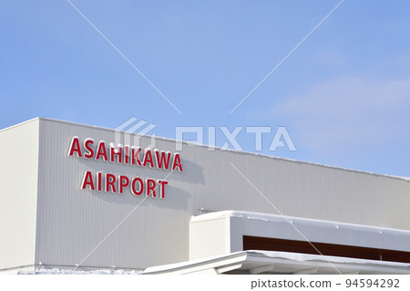 Asahikawa Airport in winter and aerial view after departure 94594292