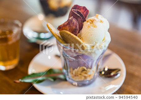 Ice parfait on a cafe table Ice parfait on a cafe table 94594540