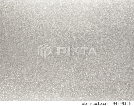 具有閃亮銀色啞光振動拋光飾面的金屬板的背景圖像 94599306