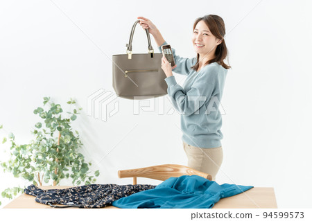 Used old clothes reuse smartphone women 94599573
