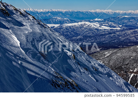 View of the Northern Alps from the Yatsugatake mountain range and Akadake ridgeline in severe winter View of the Northern Alps from the Yatsugatake mountain range and Akadake ridgeline in severe winter 94599585