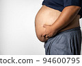 Belly of a fat man (sideways) Copy space 94600795