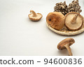 Shiitake mushrooms and oyster mushrooms in a colander and copy space 94600836